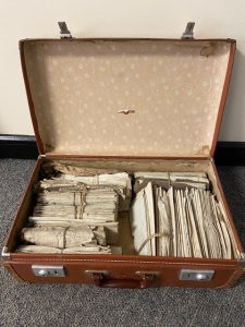 Image of suitcase containing archival papers